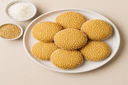 آموزش تهیه شیرینی کنجدی نارگیلی