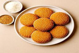 آموزش تهیه شیرینی کنجدی نارگیلی